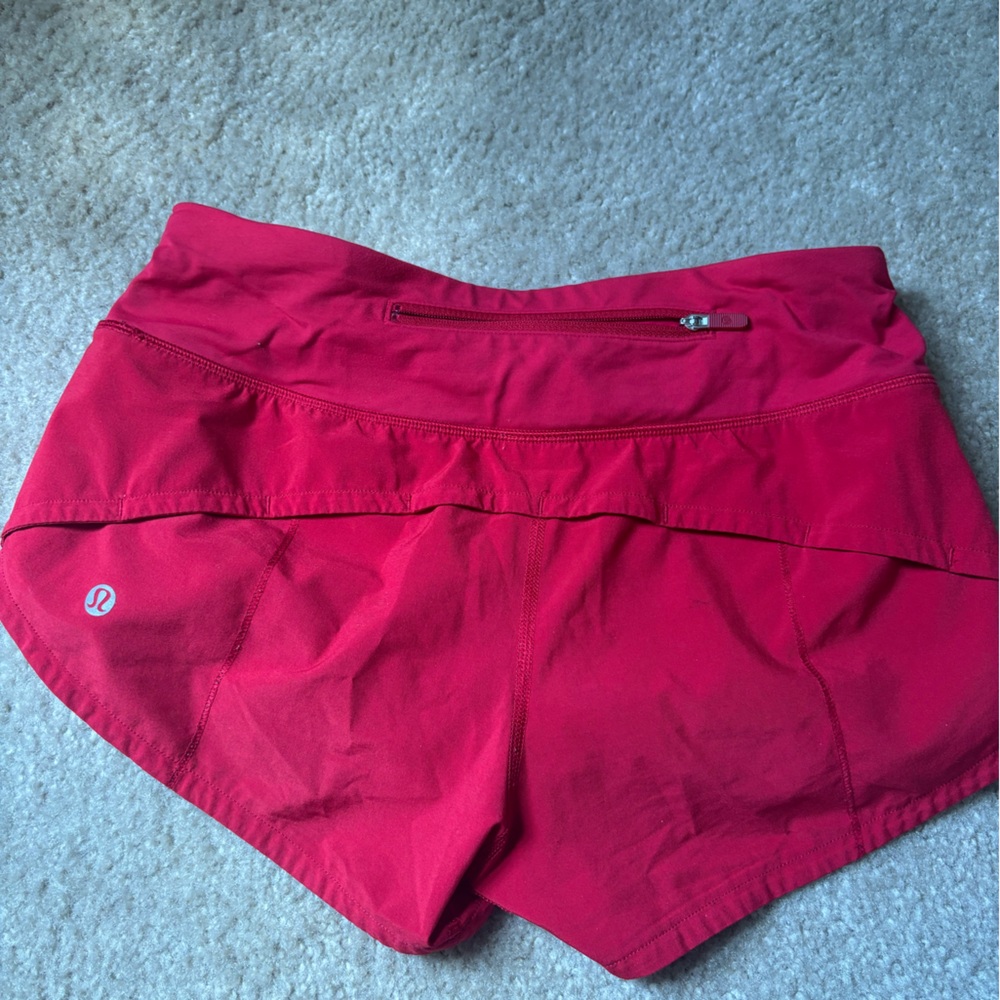 Red Lululemon Speed Up shorts